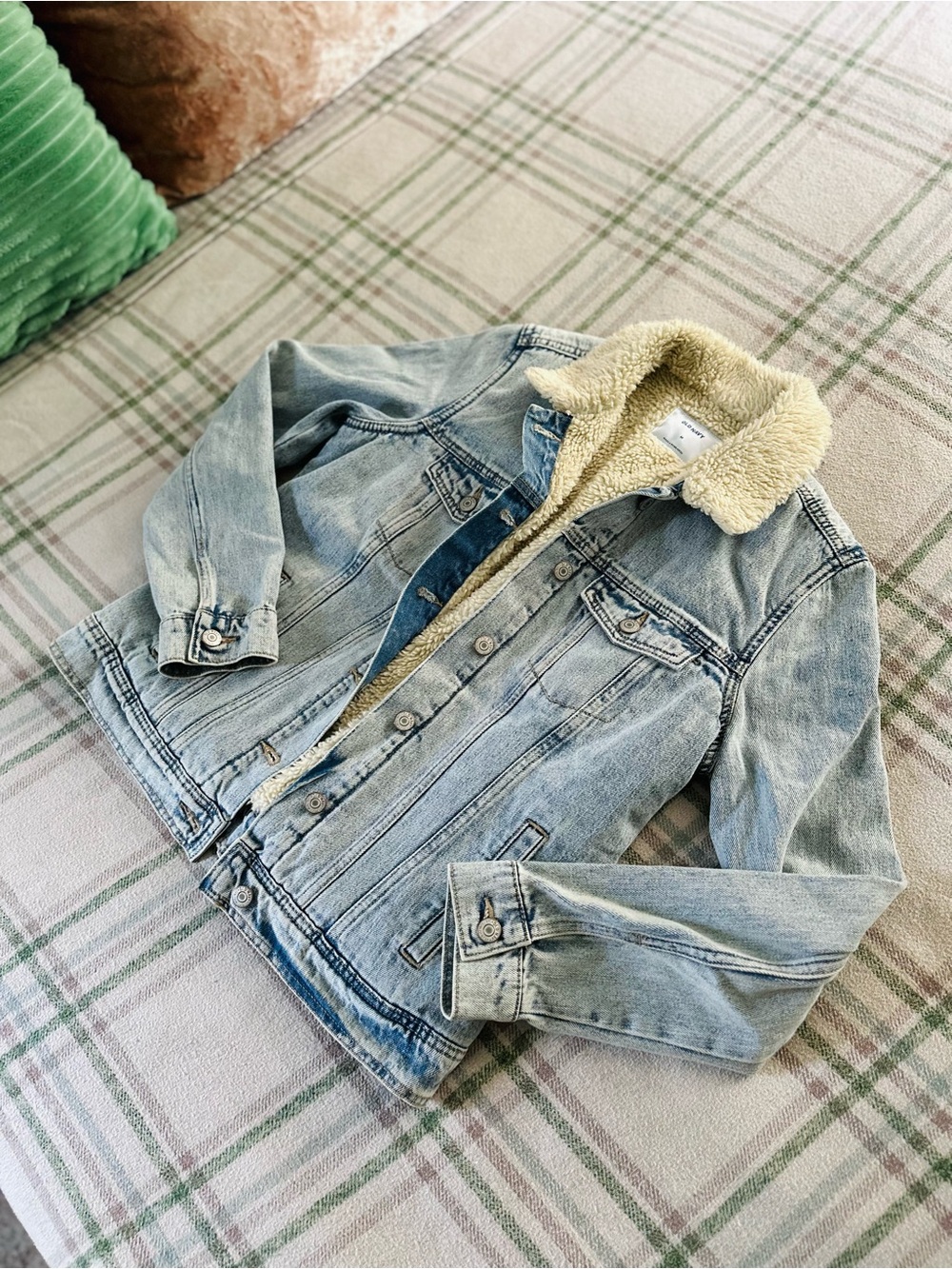 Sherpa lined light wash denim jacket